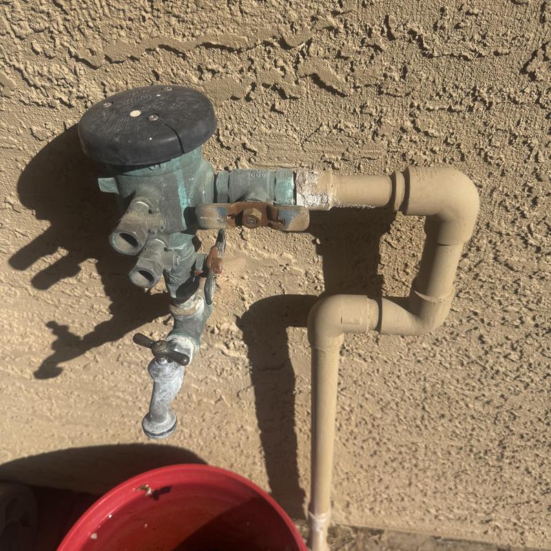 Pressure vacuum breaker and hose bib assembly on wall Pressure vacuum breaker and hose bib assembly on wall
