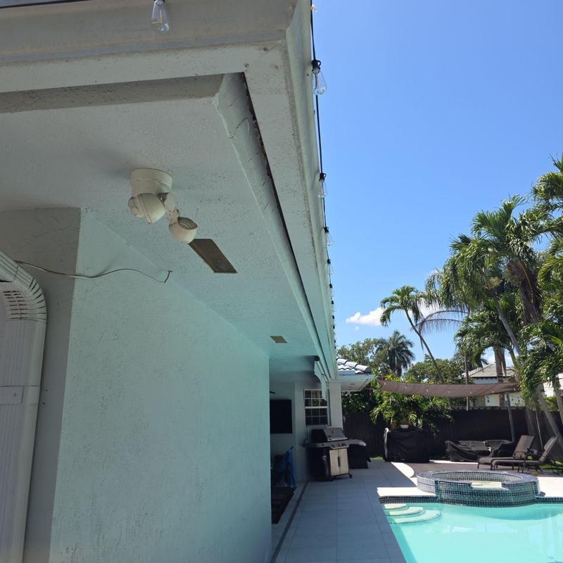 Roof gutter loose with damage near pool patio