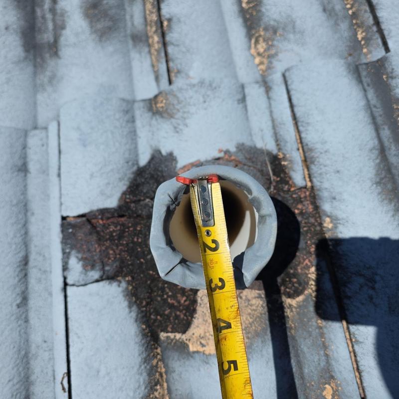 Tile roof vent pipe with tape and measuring tape