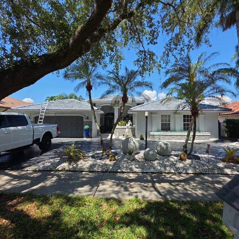 Tile roof and driveway with landscaping in Miami