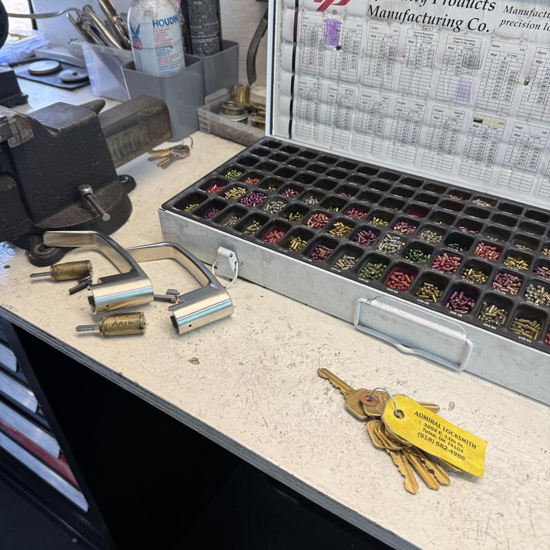 Lever lock cylinders with rekeying pins and keys