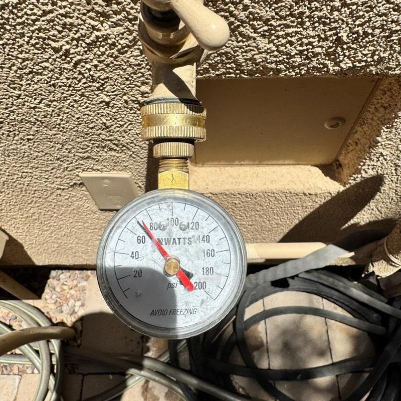 Water pressure gauge reading at irrigation valve