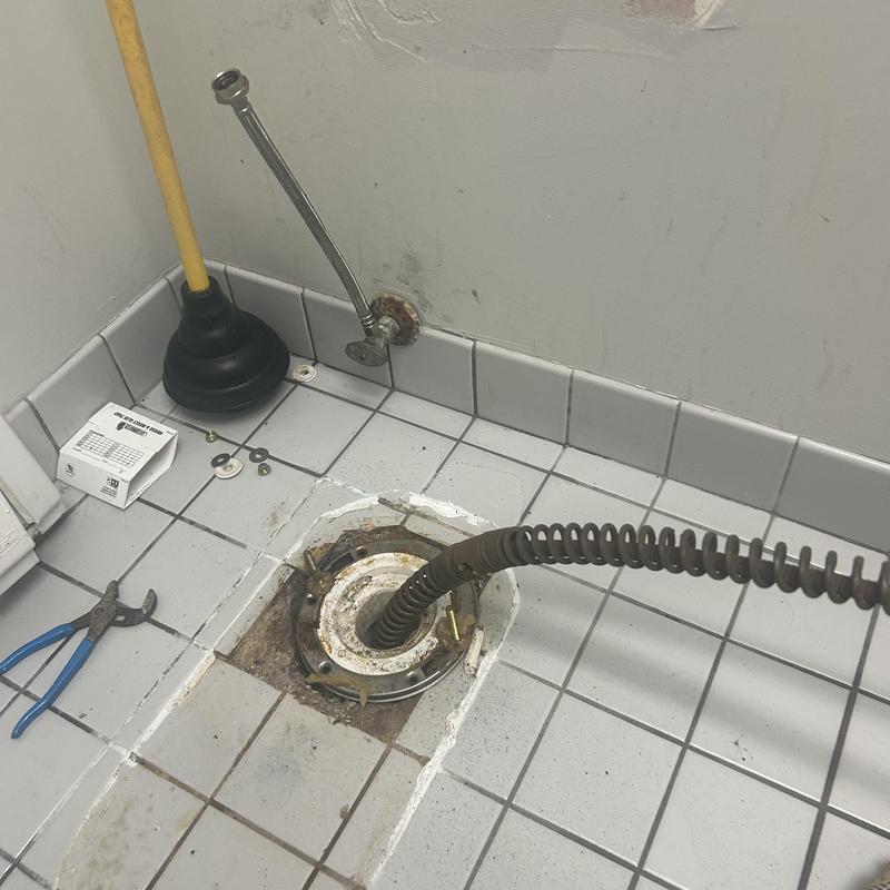 Main line drain with inspection camera in restroom Main line drain with inspection camera in restroom