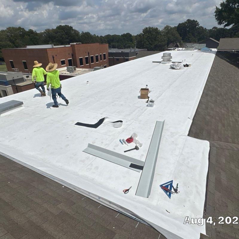 TPO roofing membrane replacement on flat roof