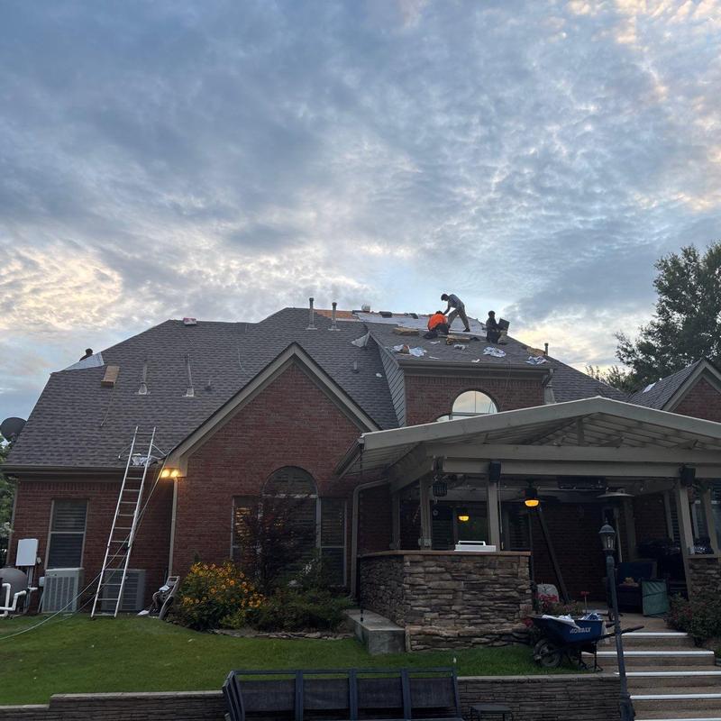 Owens Corning Oakridge asphalt roofing installation workers
