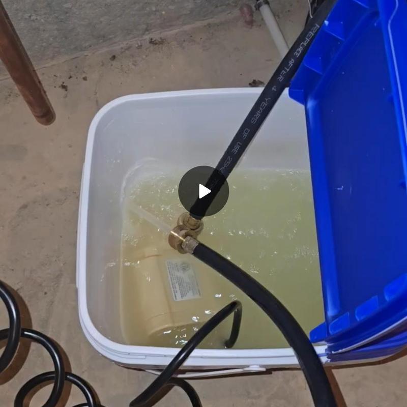 Tankless water heater descaling and maintenance in bucket