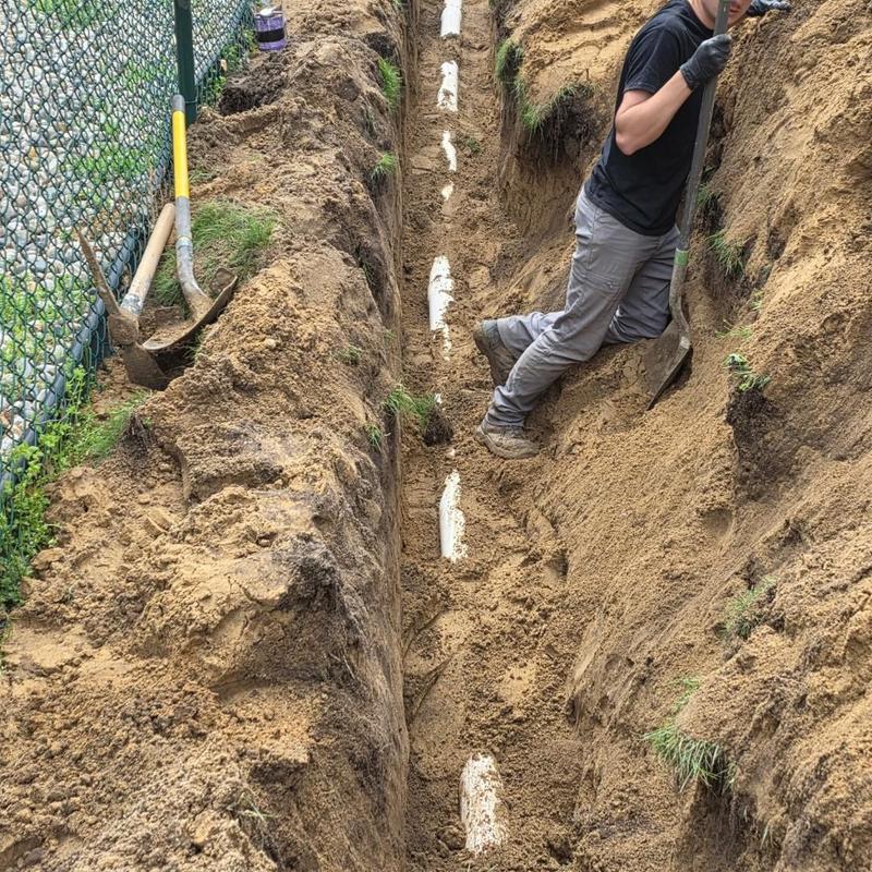 4-inch PVC pipe trench excavation for septic bypass