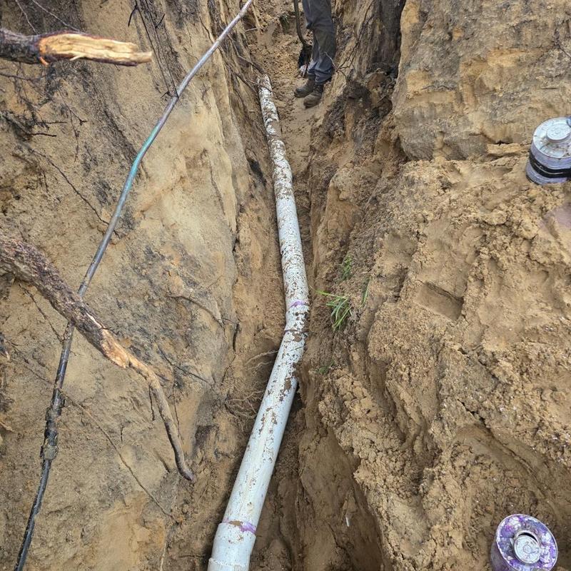 4 inch PVC pipe installation in trench for septic bypass