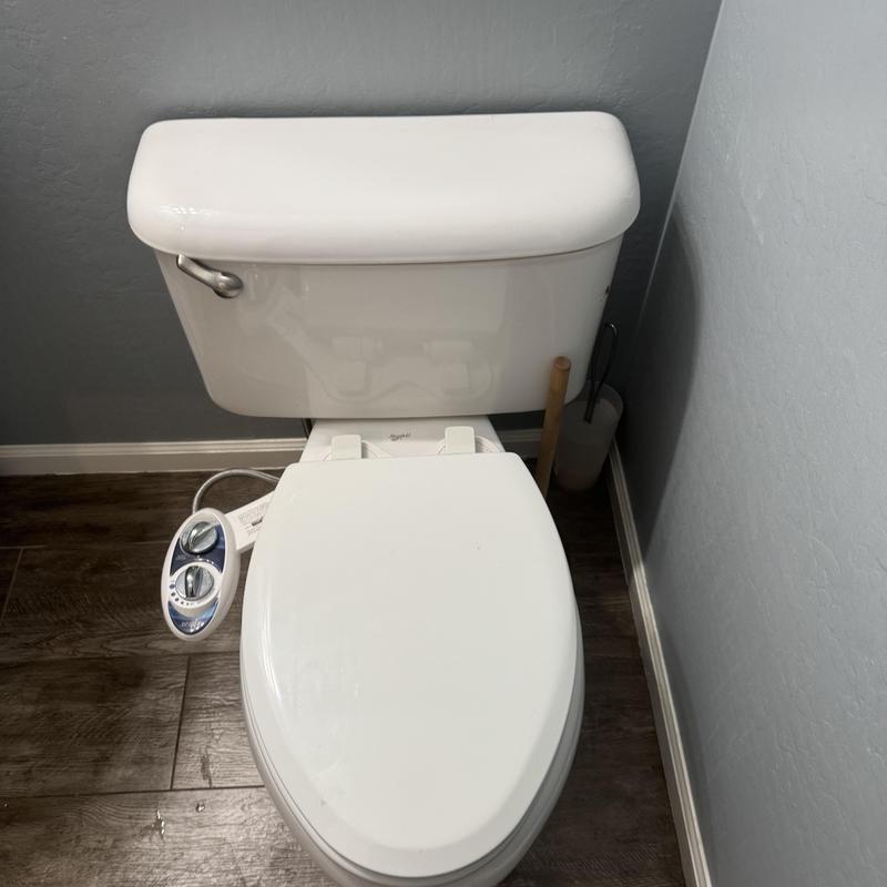 Toilet wax ring replacement with bidet attachment Toilet wax ring replacement with bidet attachment