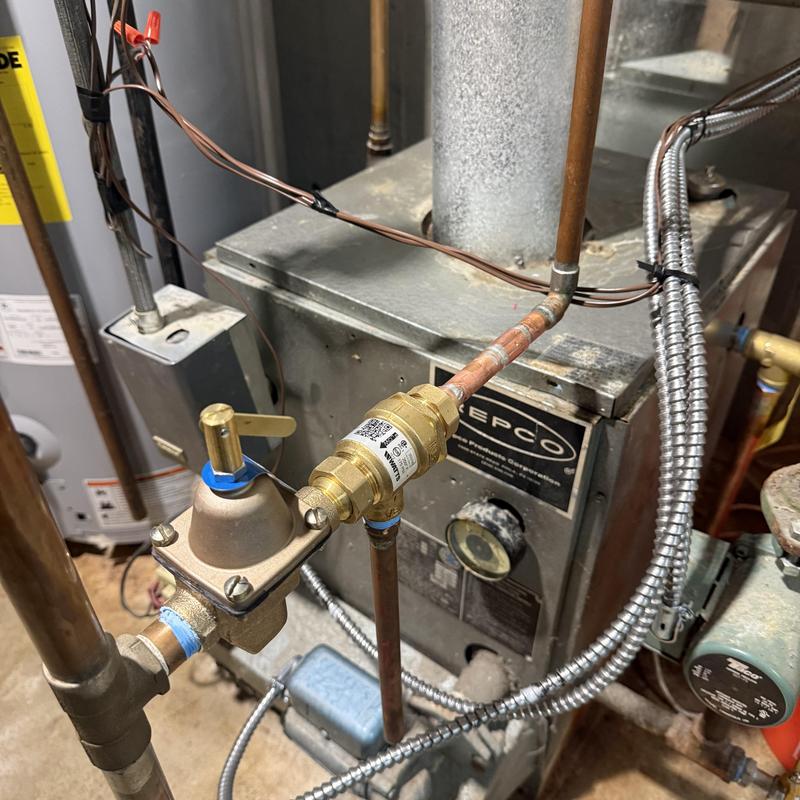 Boiler pressure relief valve and copper piping installation