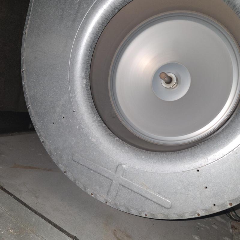 Blower motor wheel rotating inside metal housing Blower motor wheel rotating inside metal housing
