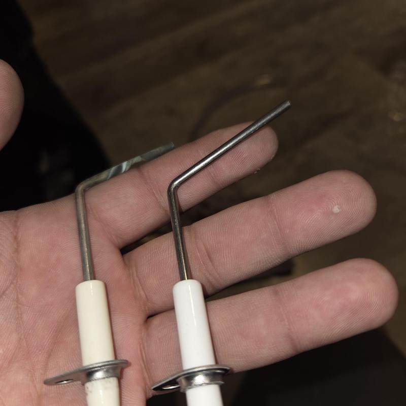 Bryant gas furnace flame sensor replacement parts in hand Bryant gas furnace flame sensor replacement parts in hand
