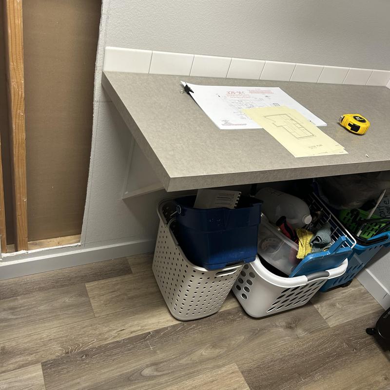 Laundry room wall opened for utility sink install planning