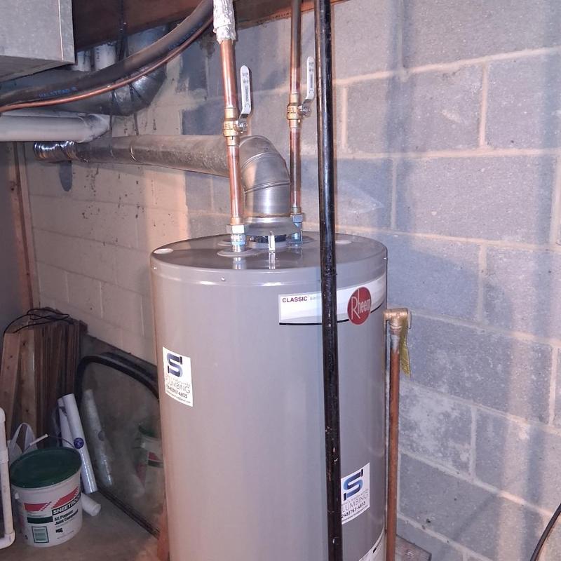 Water heater with new valves and silcock installation