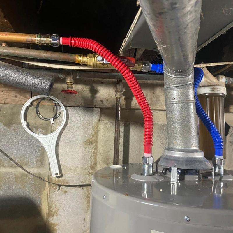 Water heater with new ball valve and gas tee installed