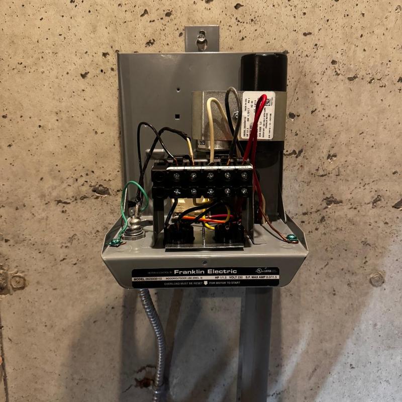 Pump control box wiring and components in basement