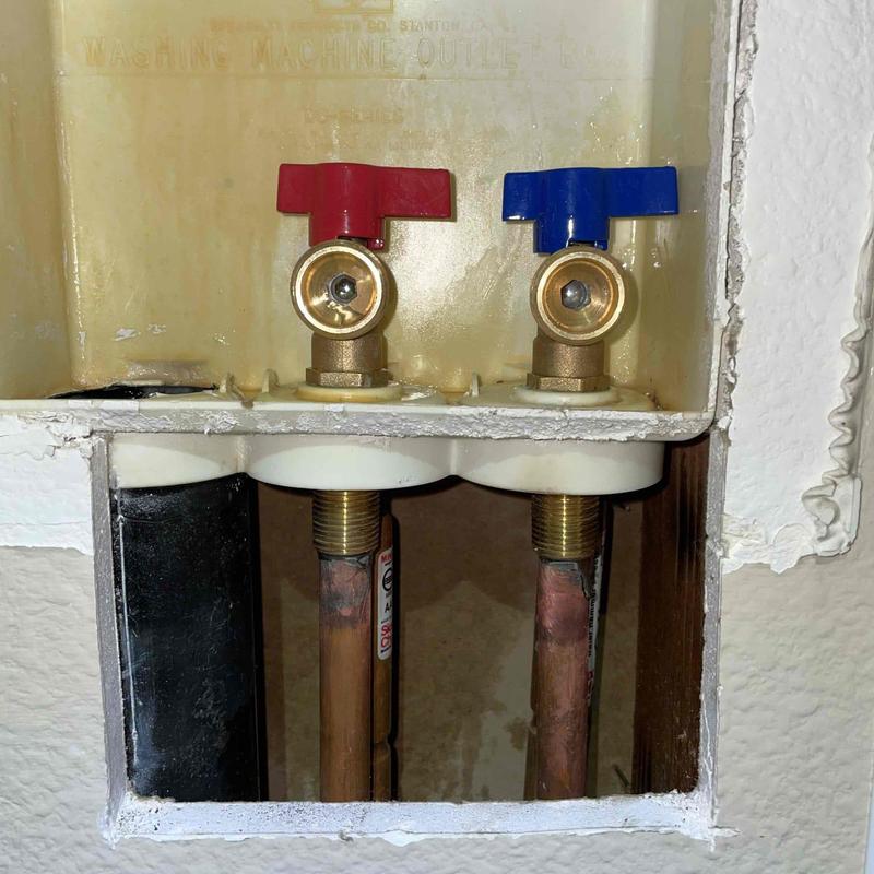 Washing machine water valves with copper piping access