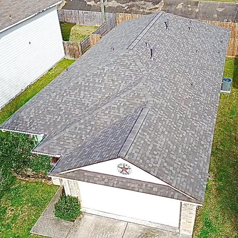 Owens Corning Oakridge shingles roof in driftwood color