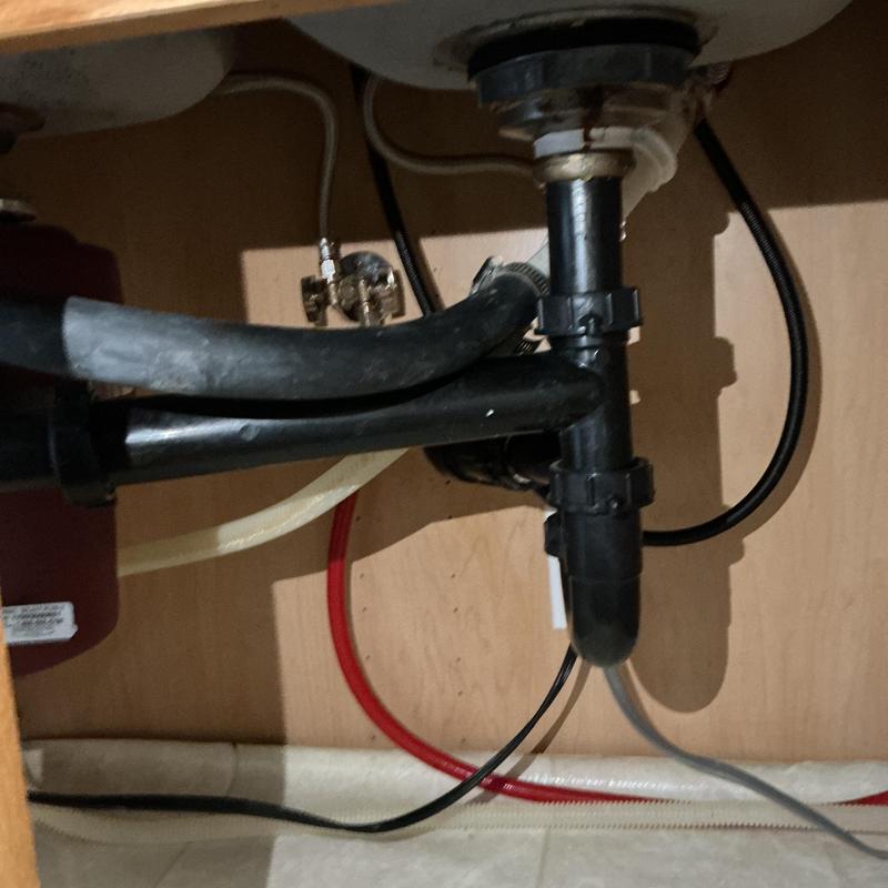 Basket strainer and drain pipe under kitchen sink Basket strainer and drain pipe under kitchen sink