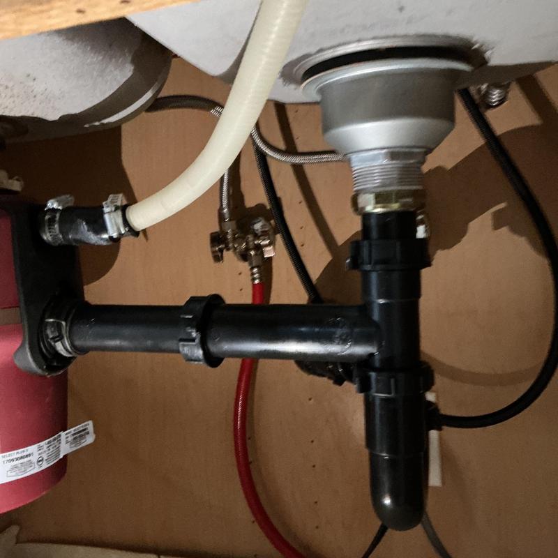 Kitchen sink basket strainer and drain piping installation Kitchen sink basket strainer and drain piping installation