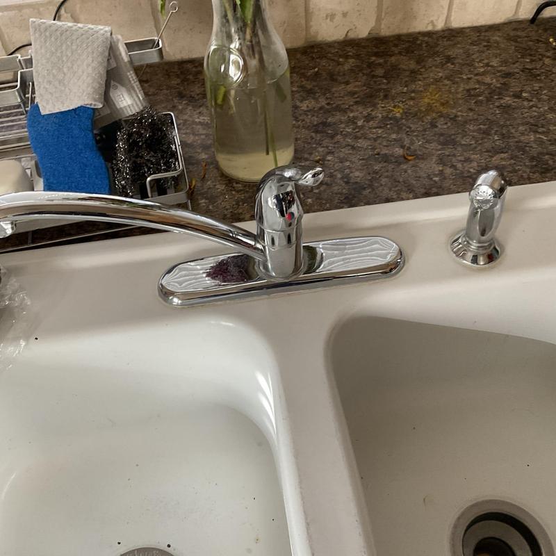 Chrome single-handle kitchen sink faucet with side spray