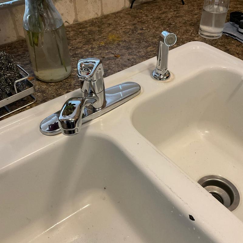 Chrome plated single handle kitchen faucet with side spray