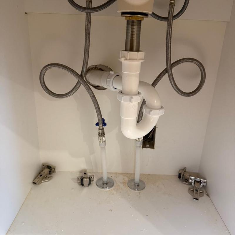 Bathroom sink drain pipe and water supply lines installation