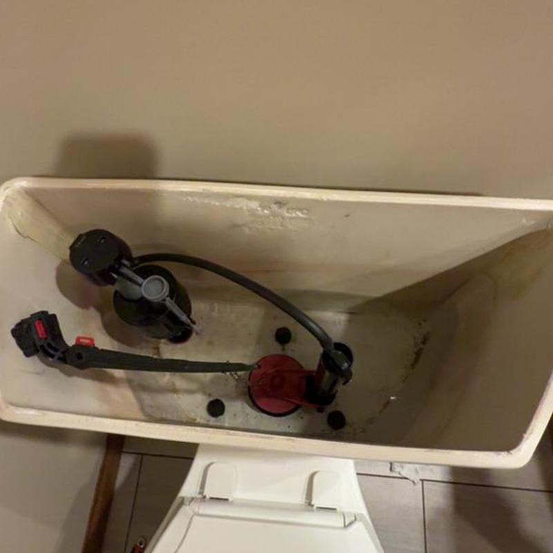 Toilet flush valve and fill valve installation inside tank