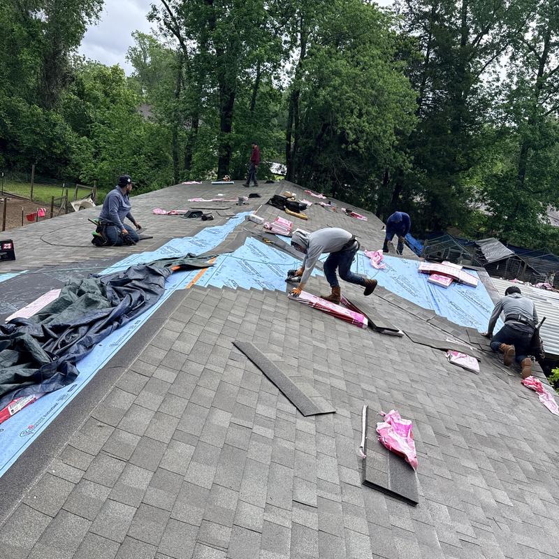 Owens Corning Oakridge shingle roof installation workers