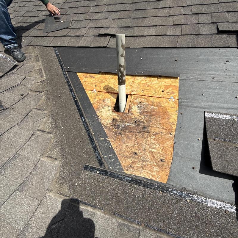 Pipe jack roof flashing repair with removed shingles