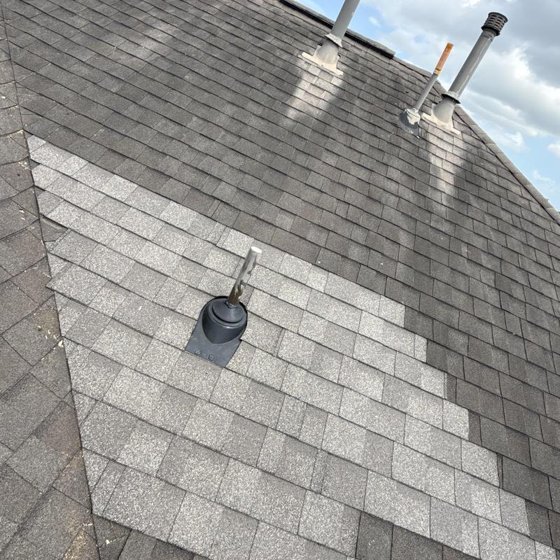 Pipe jack roof flashing with new shingles installed