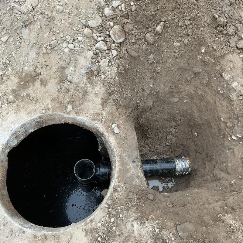 Septic tank inlet pipe with new baffle installation