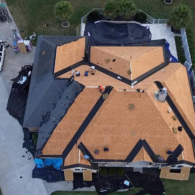 Roof decking installation on multi-section residential roof