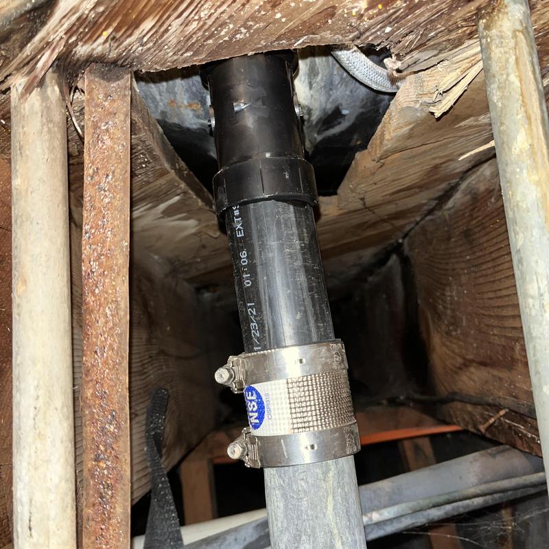 Bathtub waste and overflow pipe with new clamp installation