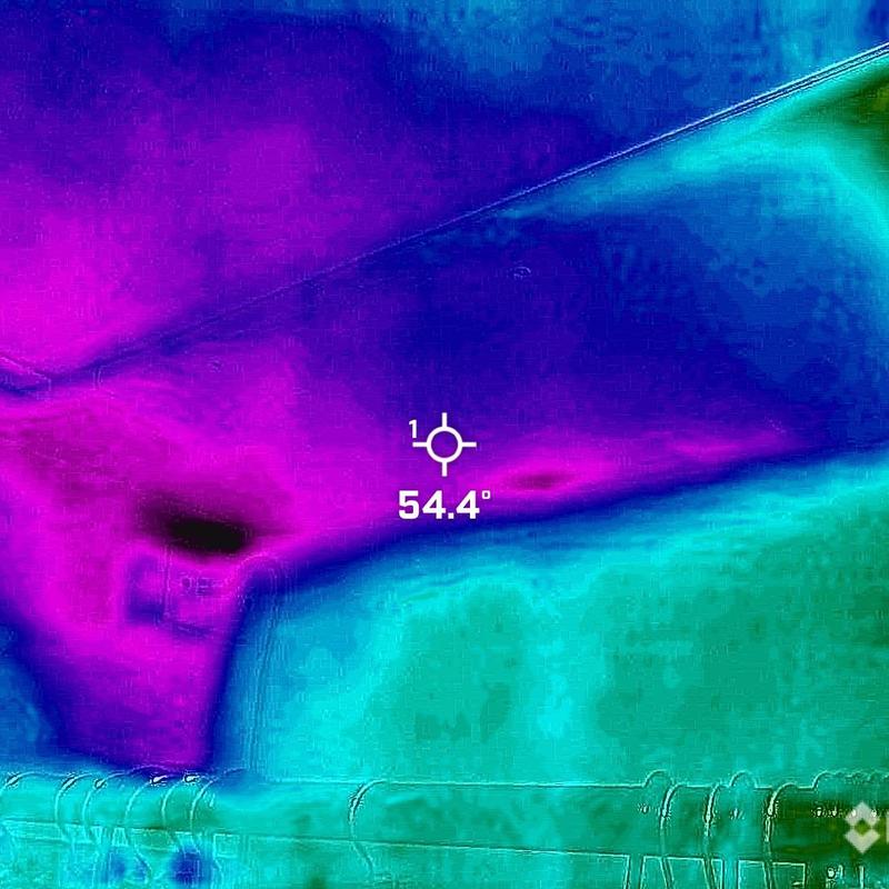 Roof leak thermal imaging showing water damage in closet