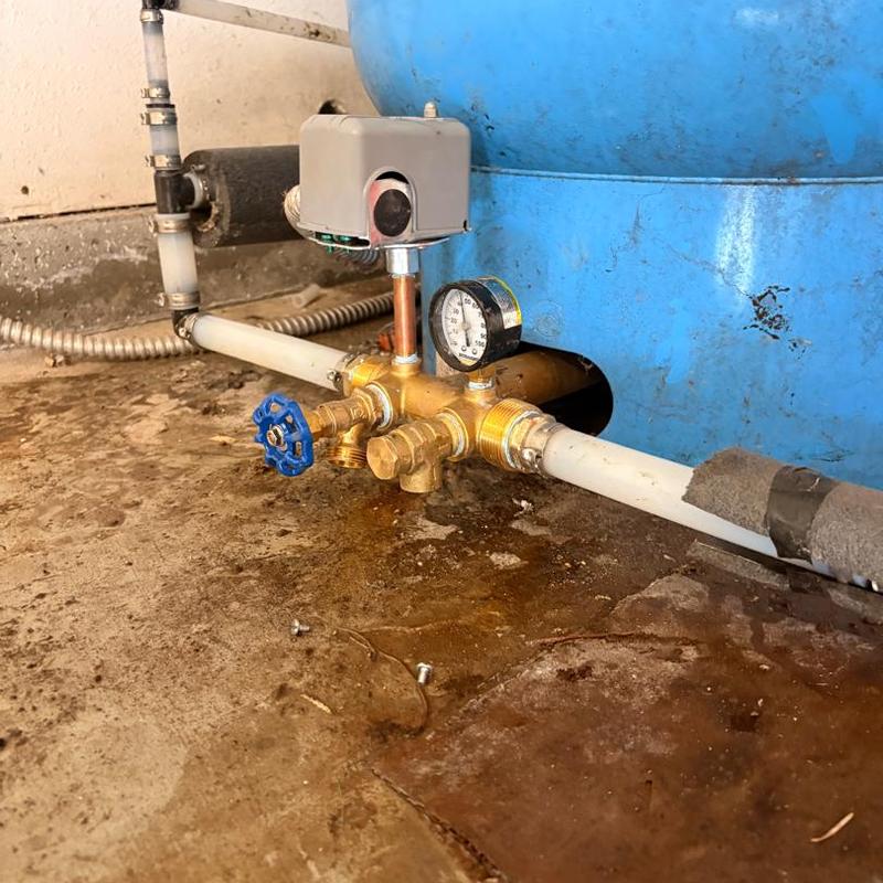 Pressure tank valve assembly with new gauge and piping