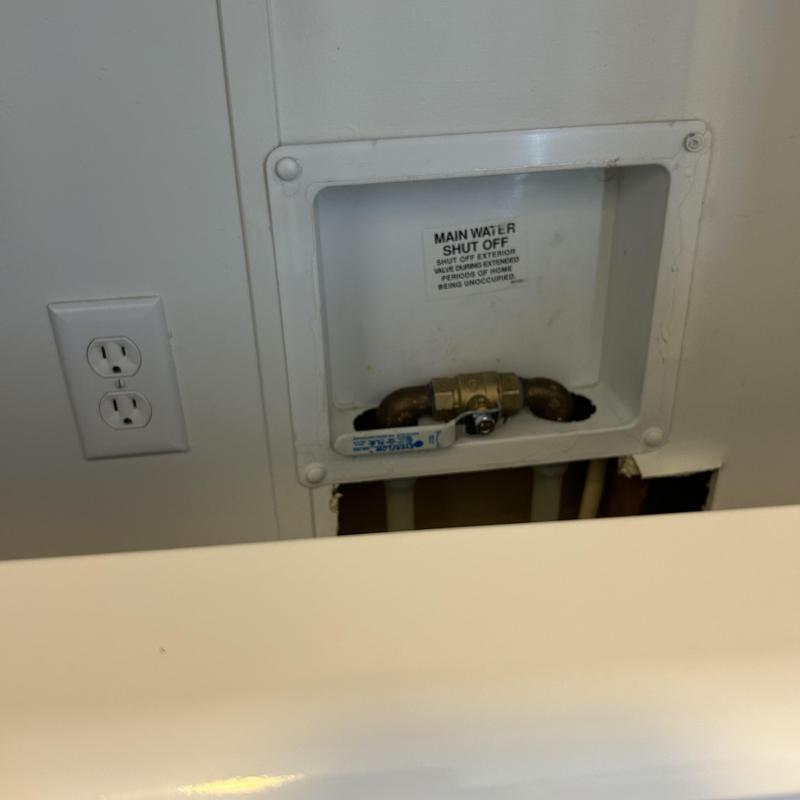 Main water shut off valve with access panel