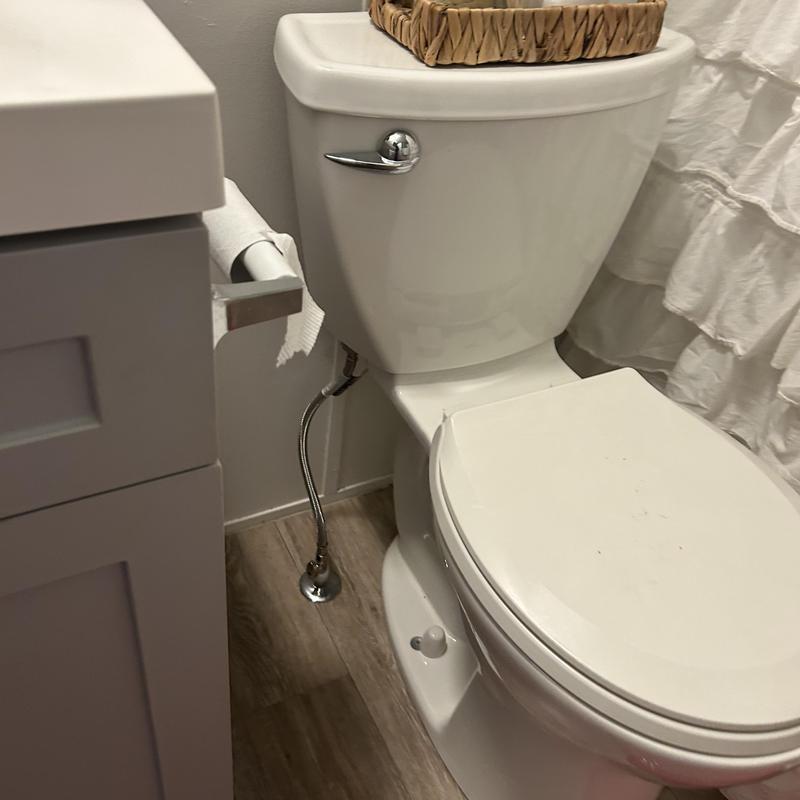 Toilet supply line and angle stop installation in bathroom
