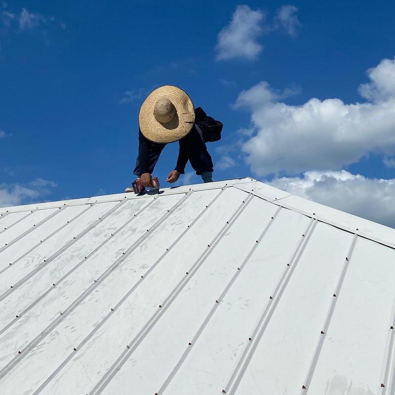 Standing seam metal roof panel repair on steep pitch