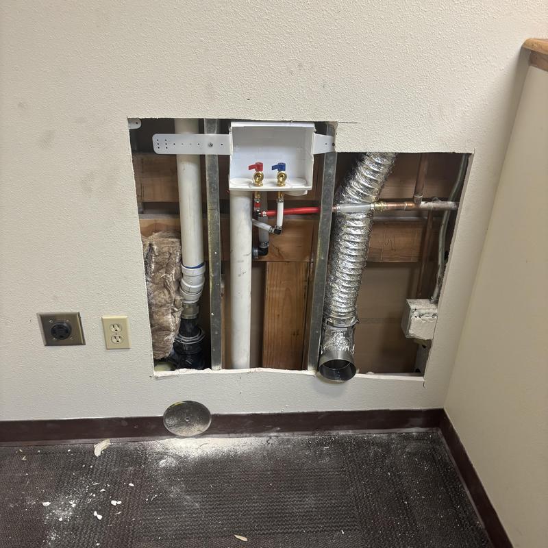 Washer box and dryer vent installation in wall cavity