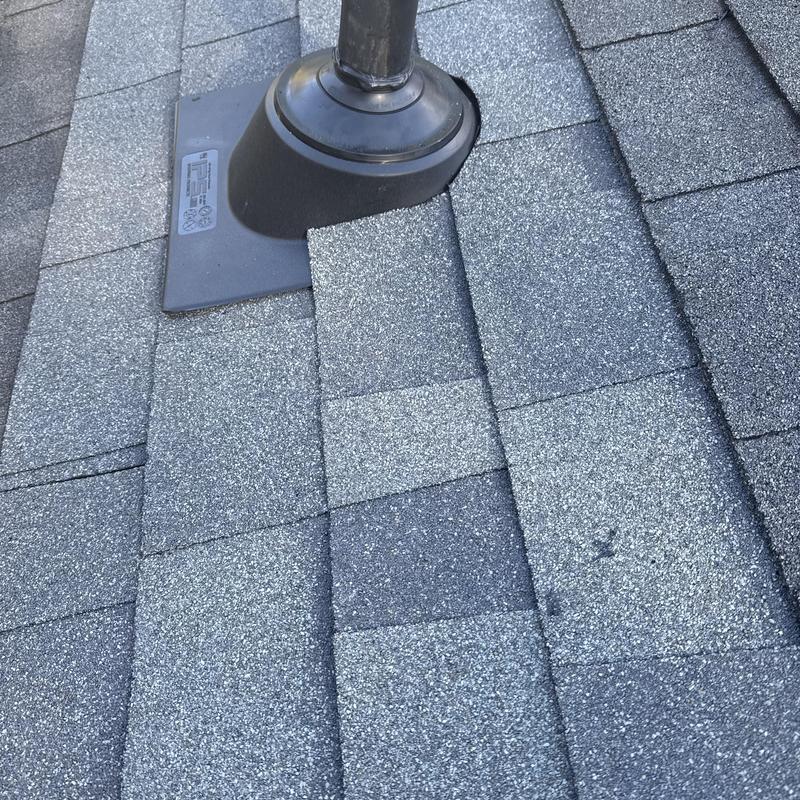 Pipe boot flashing on asphalt shingle roof