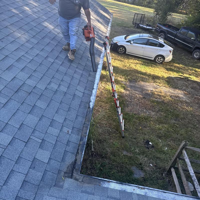Roof shingle and gutter with leaf blower maintenance