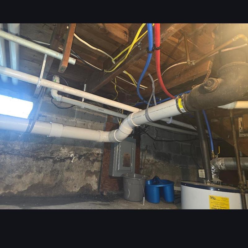 Cast iron pipe replaced with PVC piping in basement