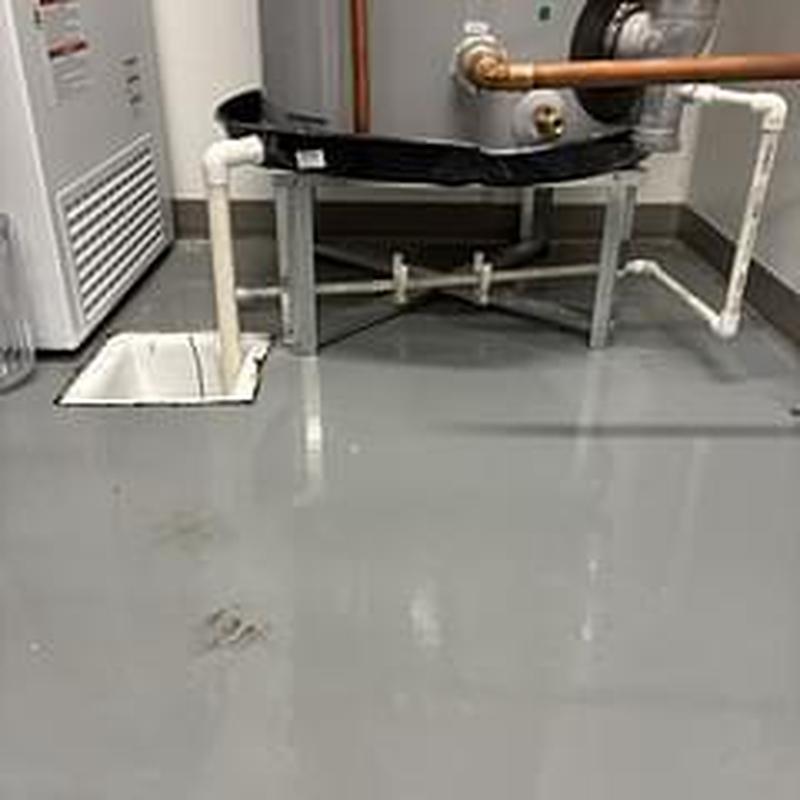 Condensate drain pipe on water heater installation
