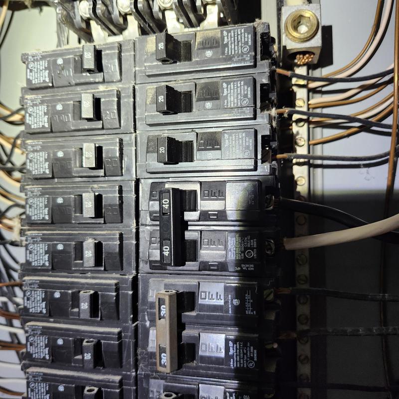 Electrical breaker panel with replaced HVAC breaker Electrical breaker panel with replaced HVAC breaker
