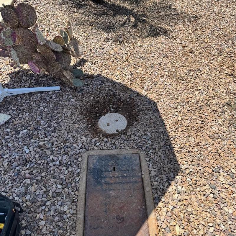 Water main valve and irrigation box in gravel bed