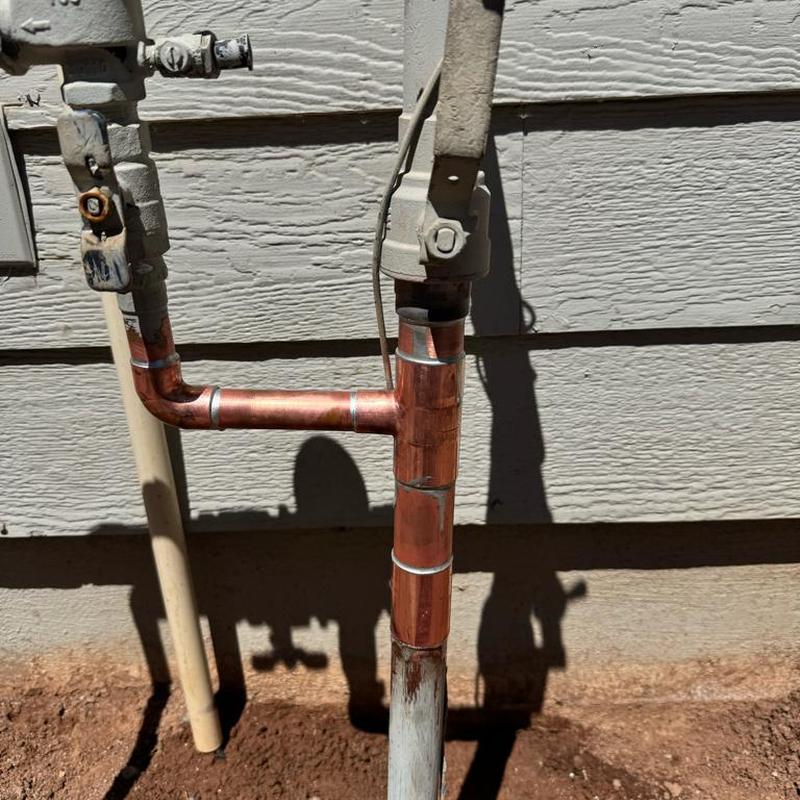 Main water riser tee with new copper fittings installed