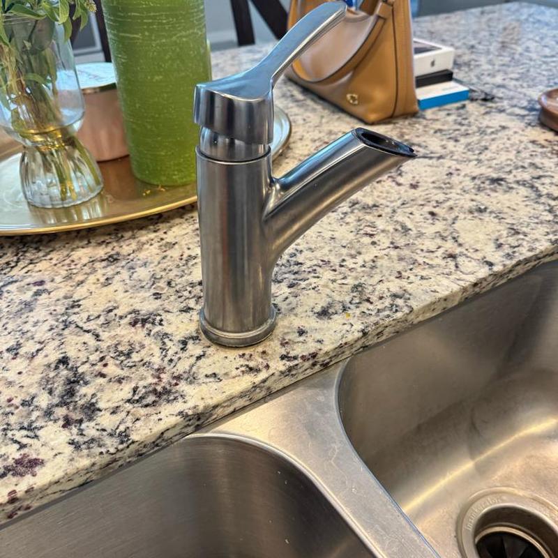 Kitchen faucet replacement on granite countertop sink