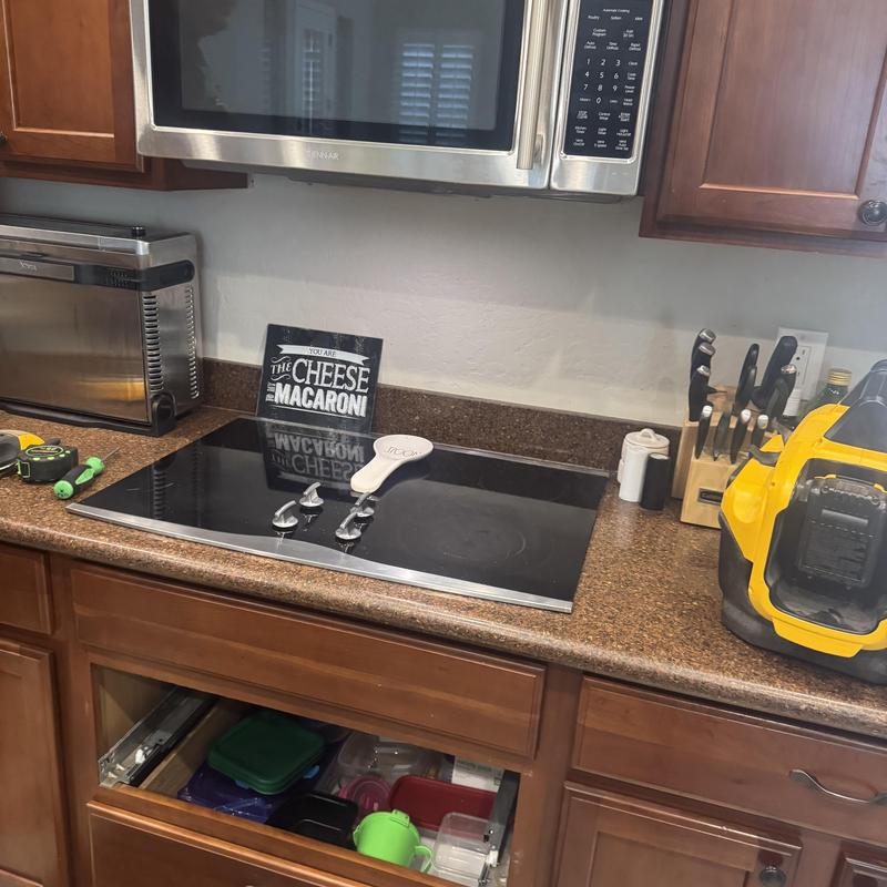 Kitchen gas stove cooktop installation tools on counter Kitchen gas stove cooktop installation tools on counter