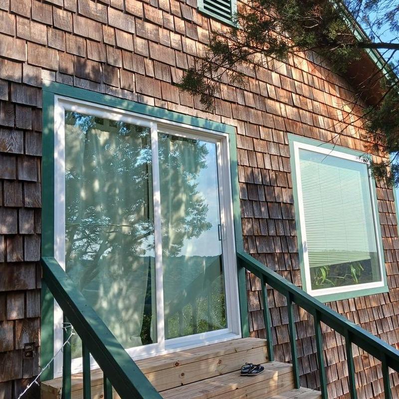 Cedar shake siding on home exterior with windows